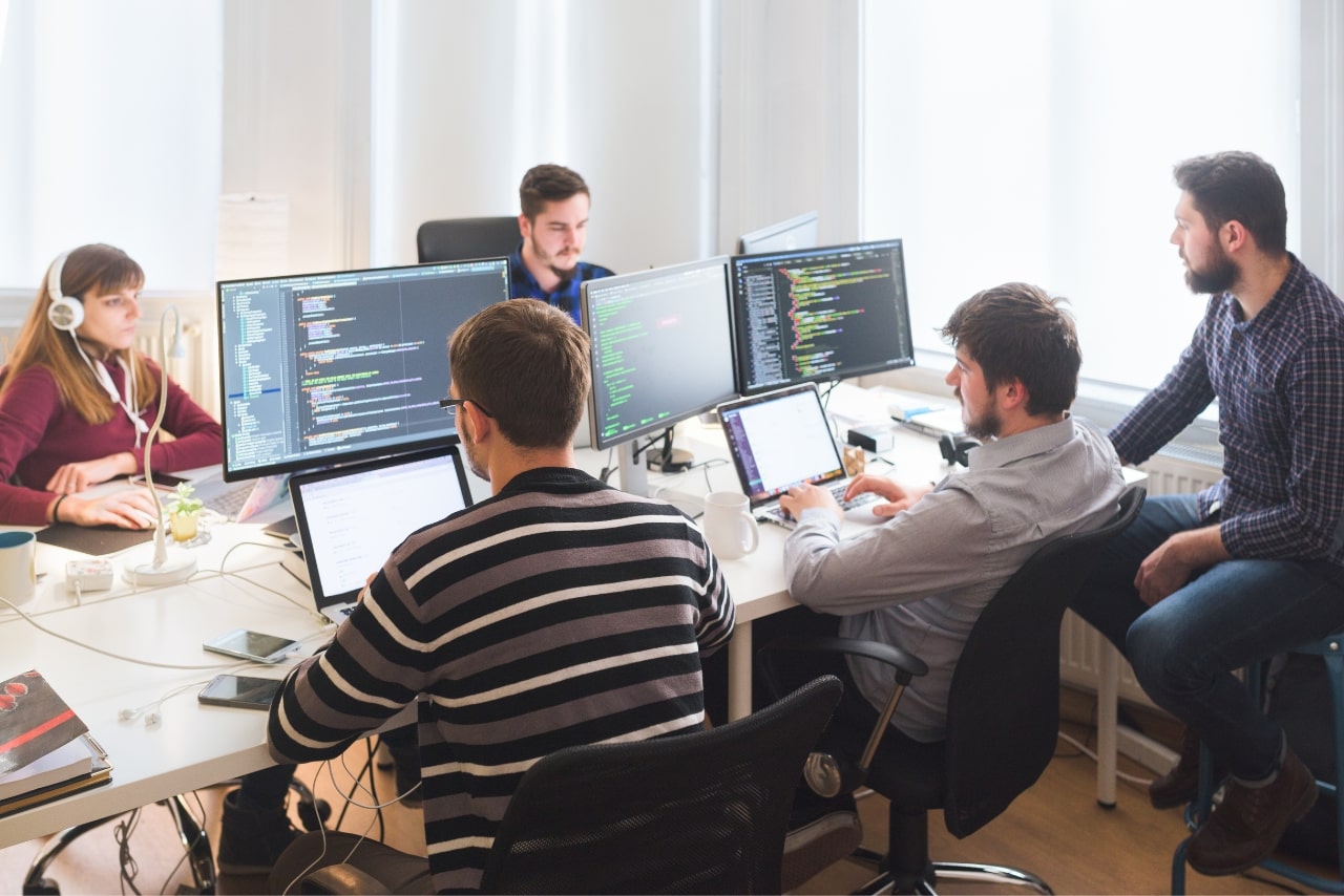 Software developing team working in the office.
