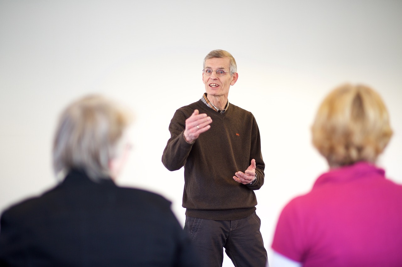 A career coach guiding two women