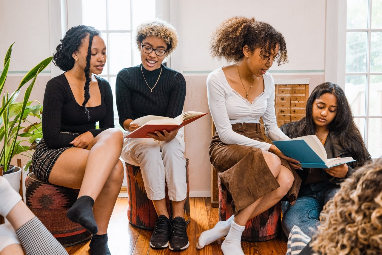A loyal book club where a group of young members read together.