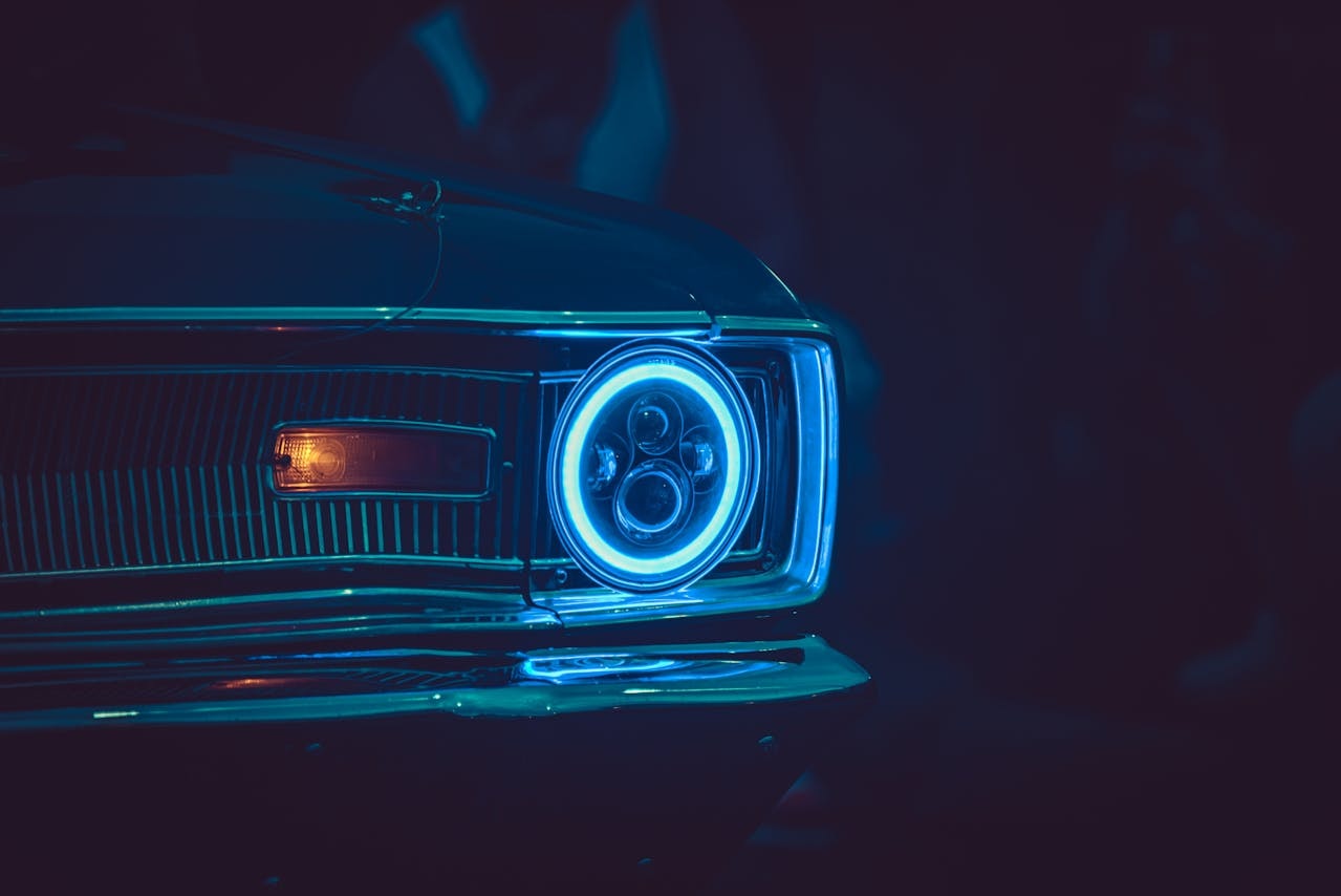 A photo of a blue neon headlight