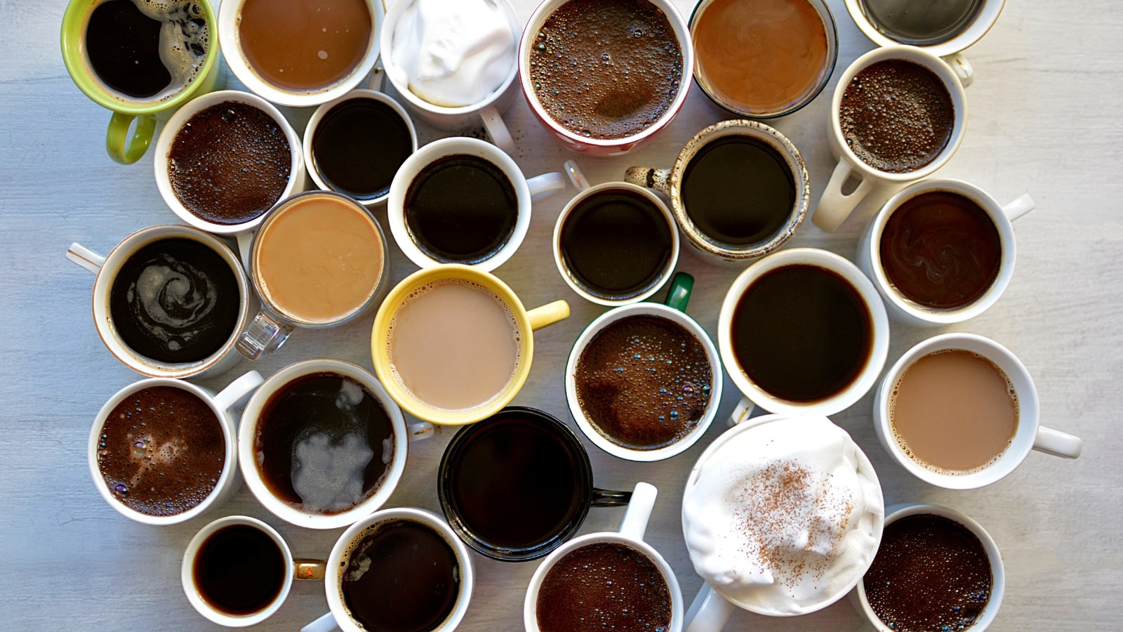 Background of coffee cups with different types of coffee.