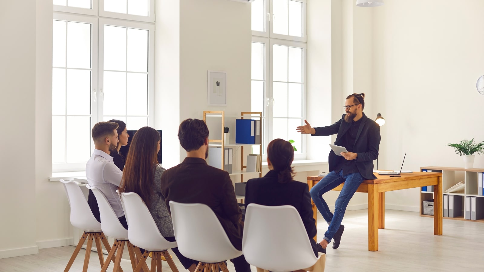 Businessman giving a training presentation to team.