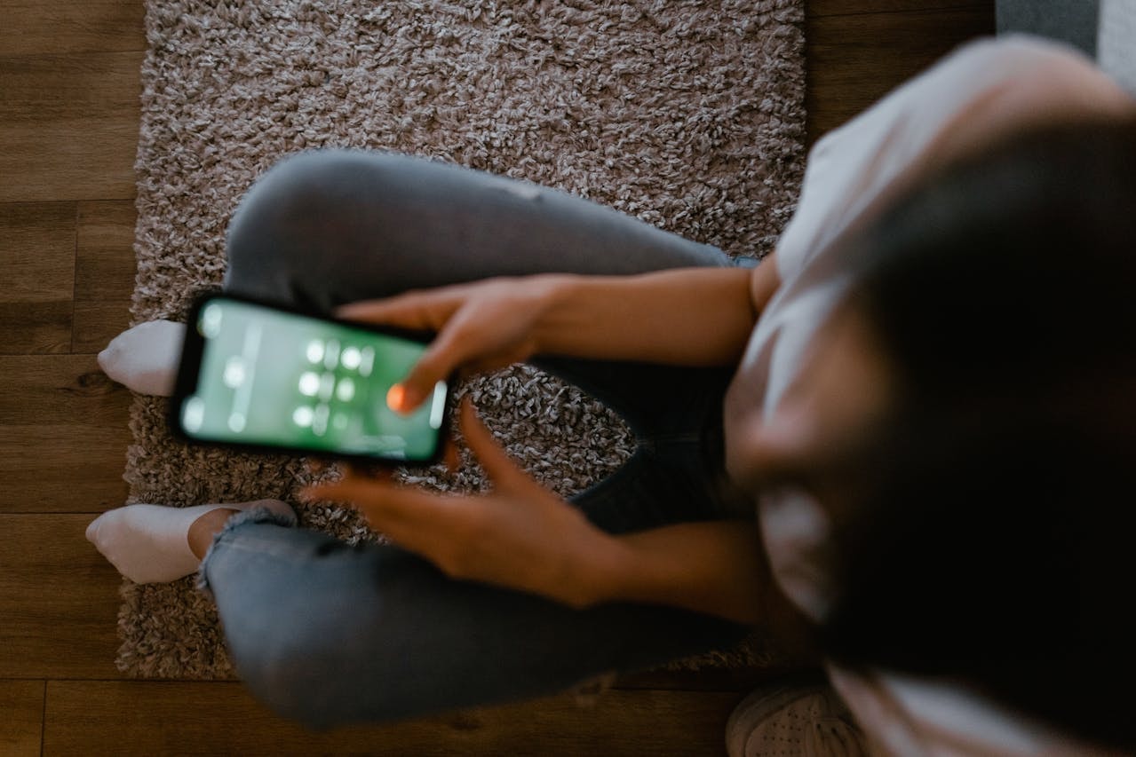 Overhead shot of a person using a smartphone