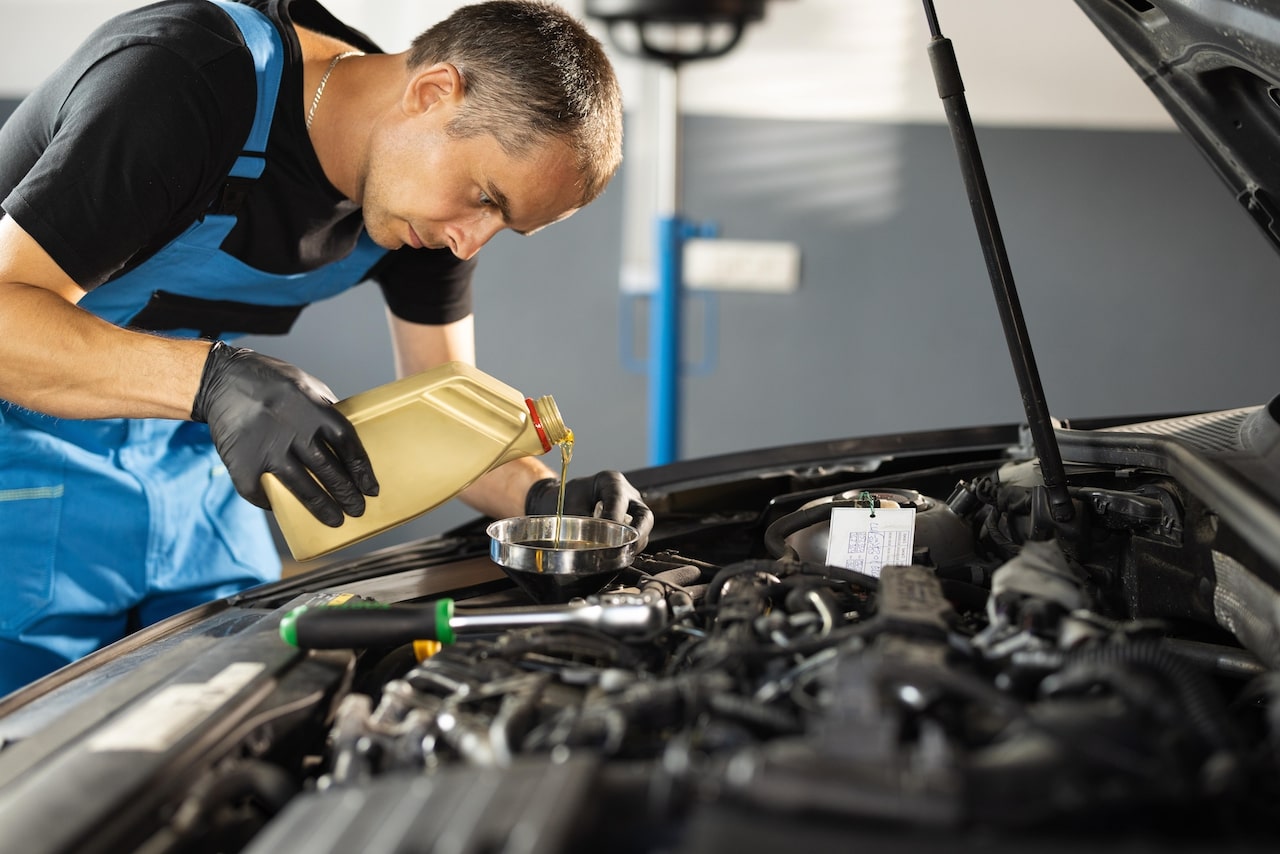 Person doing oil change