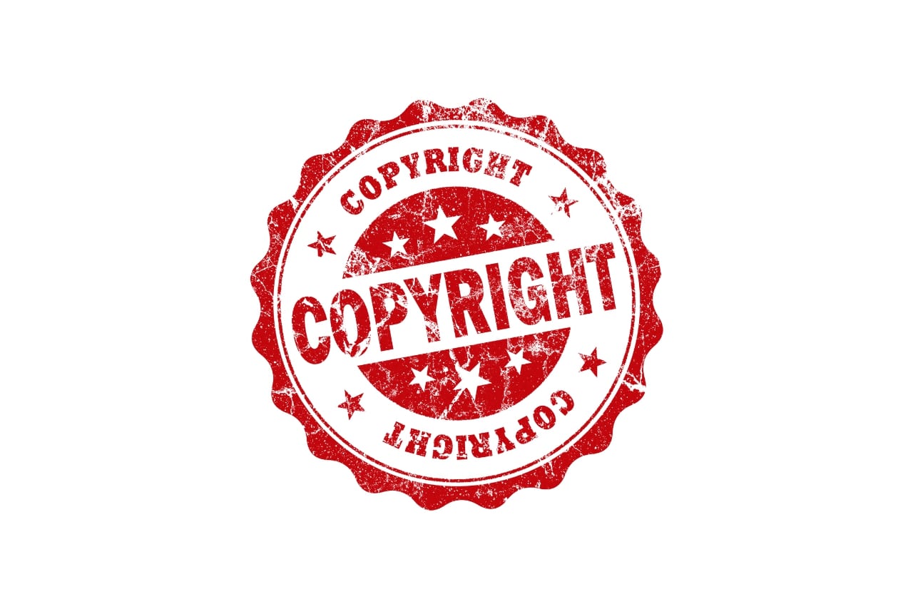 Red colored copyright stamp.