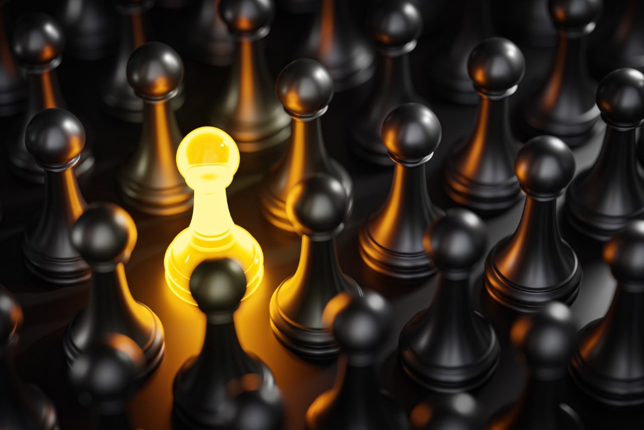Standout concept Yellow glow pawn chess between black pawns 3D render.