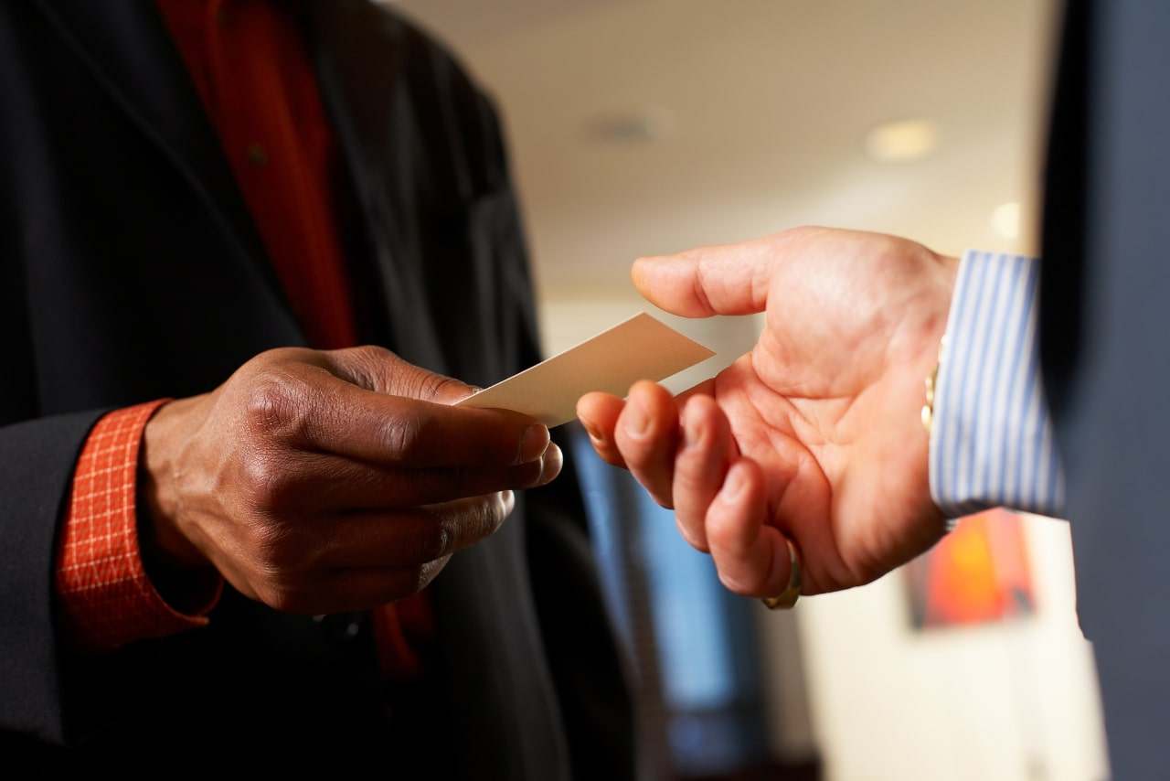Two men forming networking and partnerships opportunities.