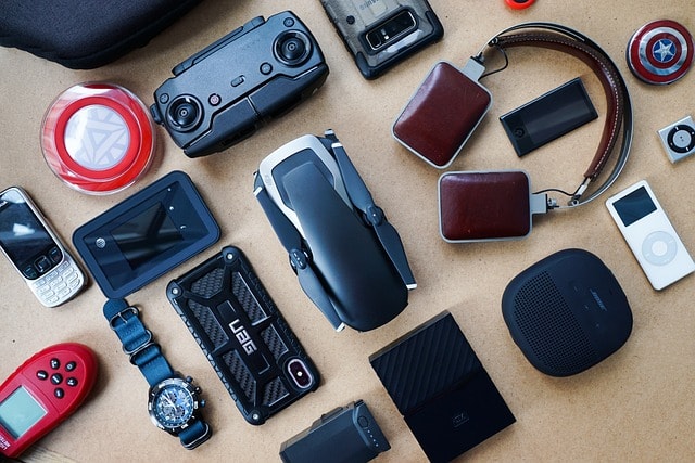 Various technological products placed on table.