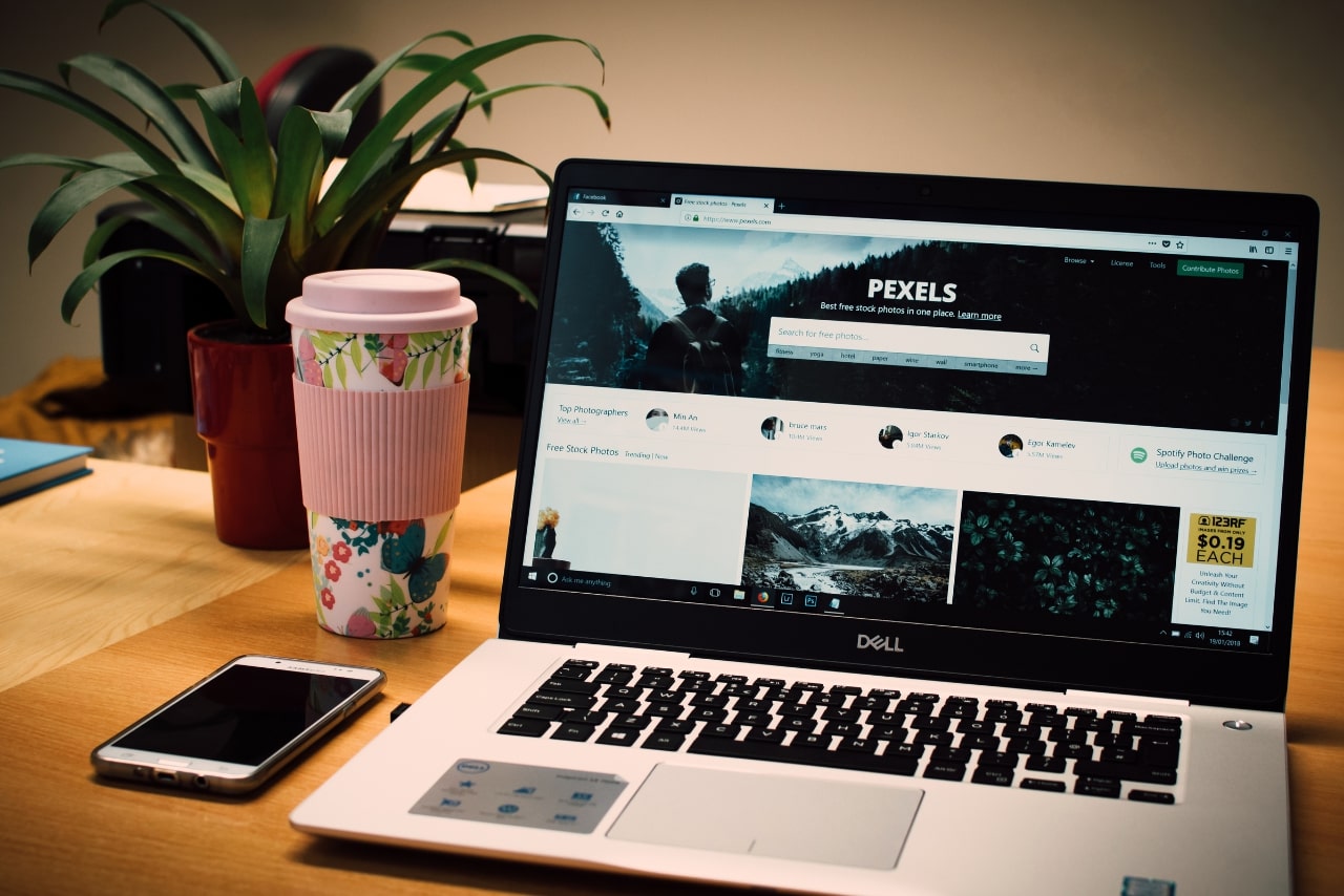 Website page shown on laptop screen.