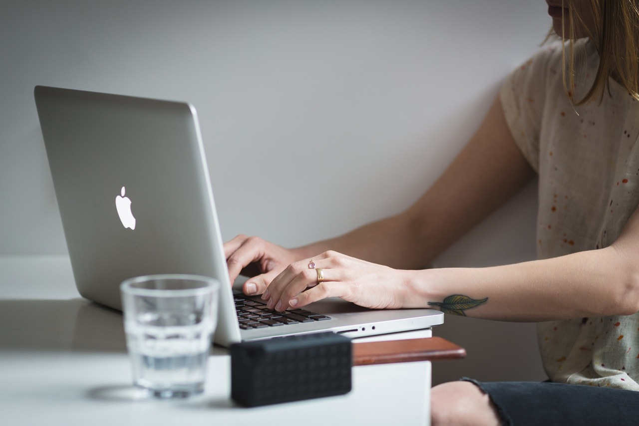 Woman doing research on laptop.