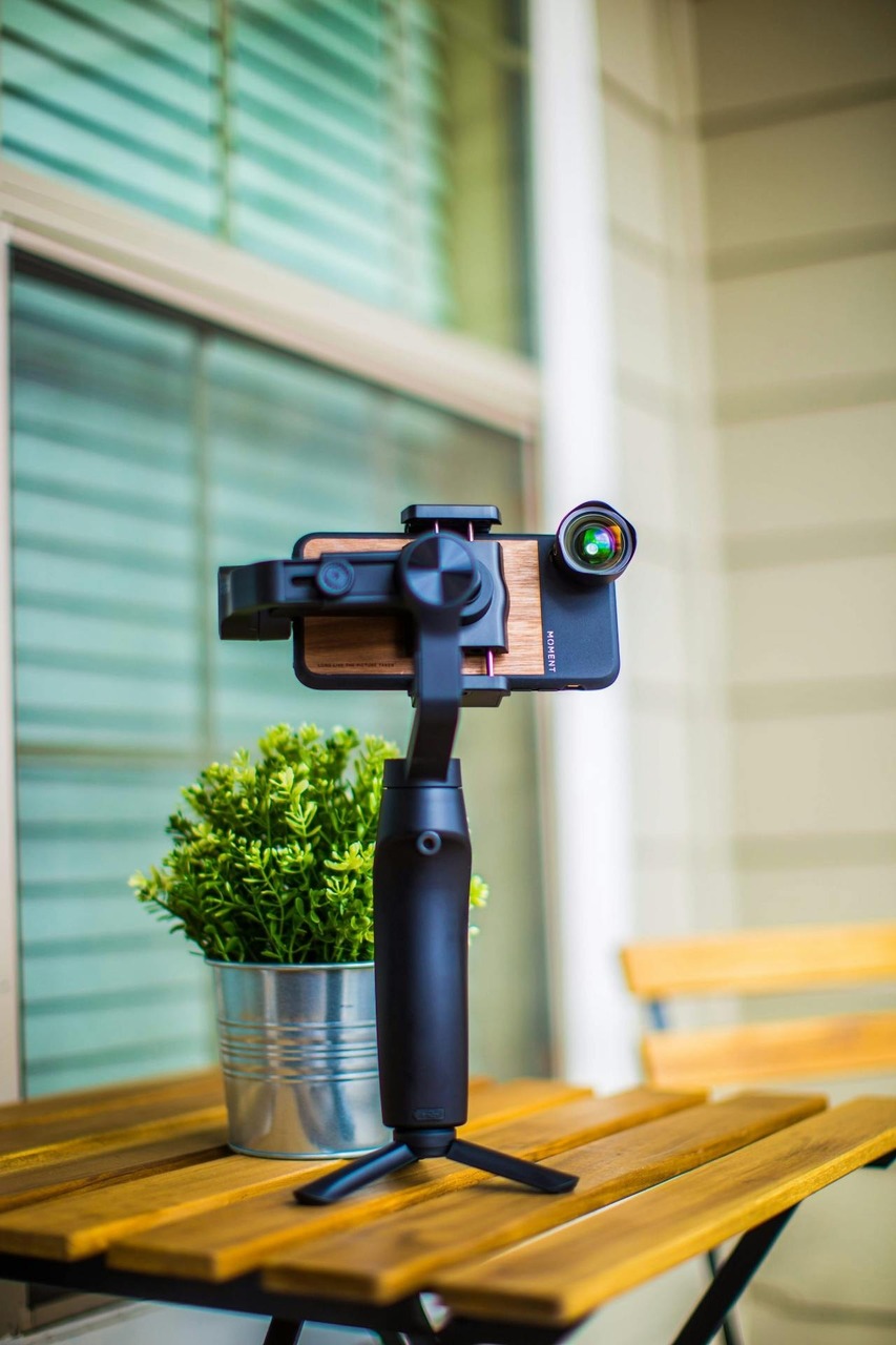 A smartphone with special lens and a tripod