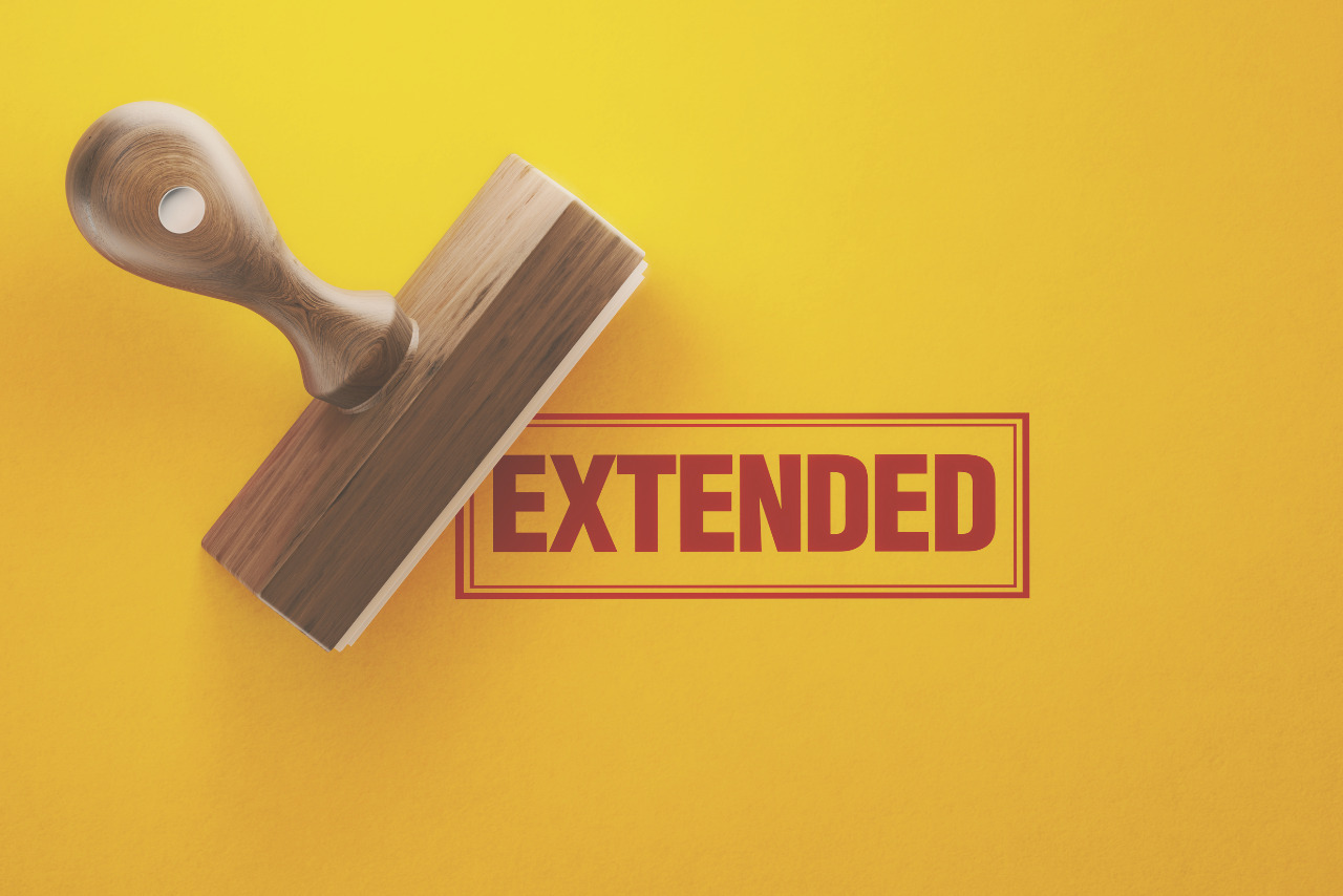 Wooden Extended Stamp On Yellow Background.