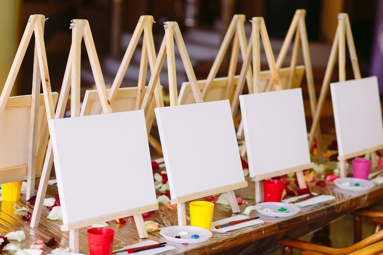 Painting materials for art class or workshop.