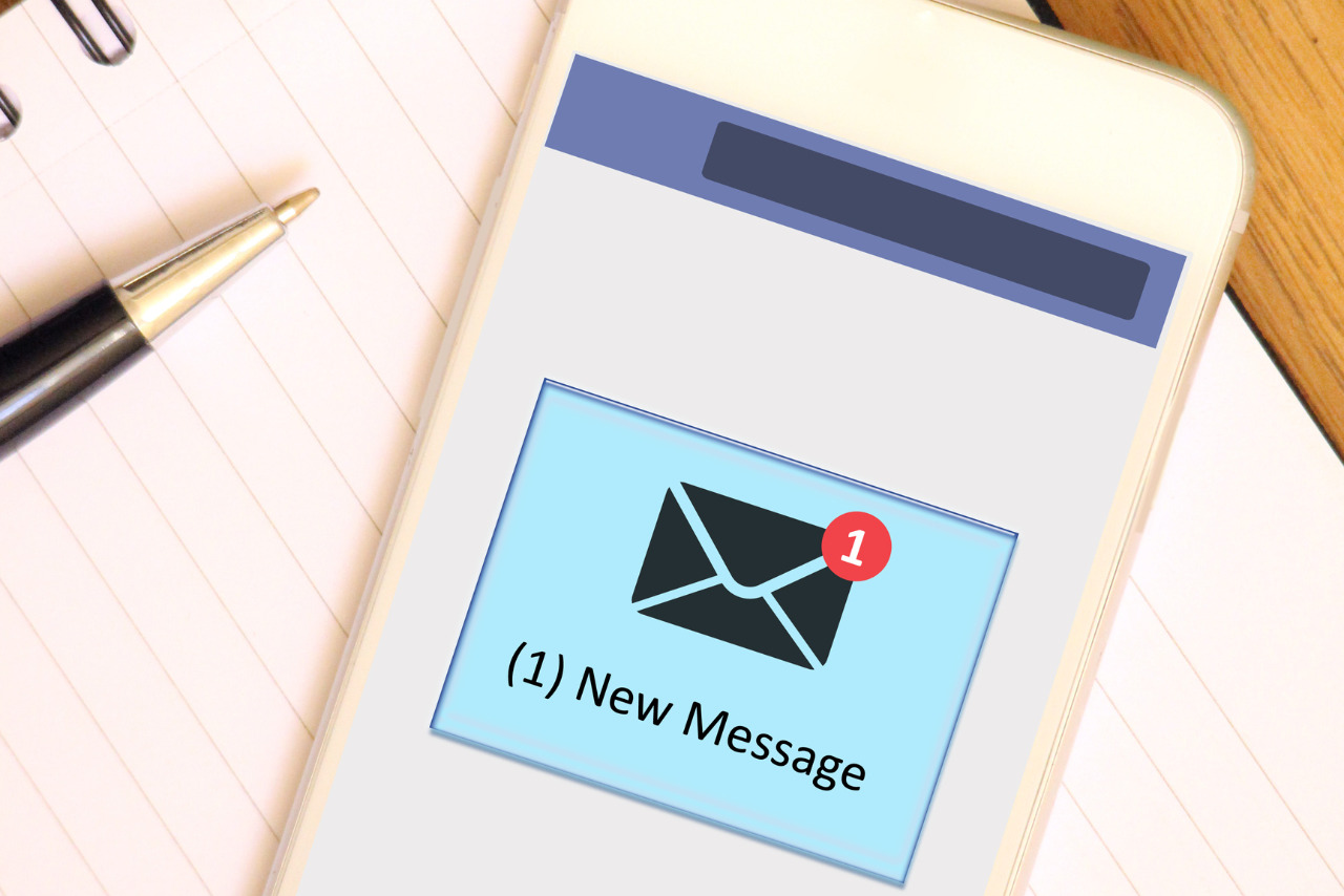 New Message notification pops on phone.