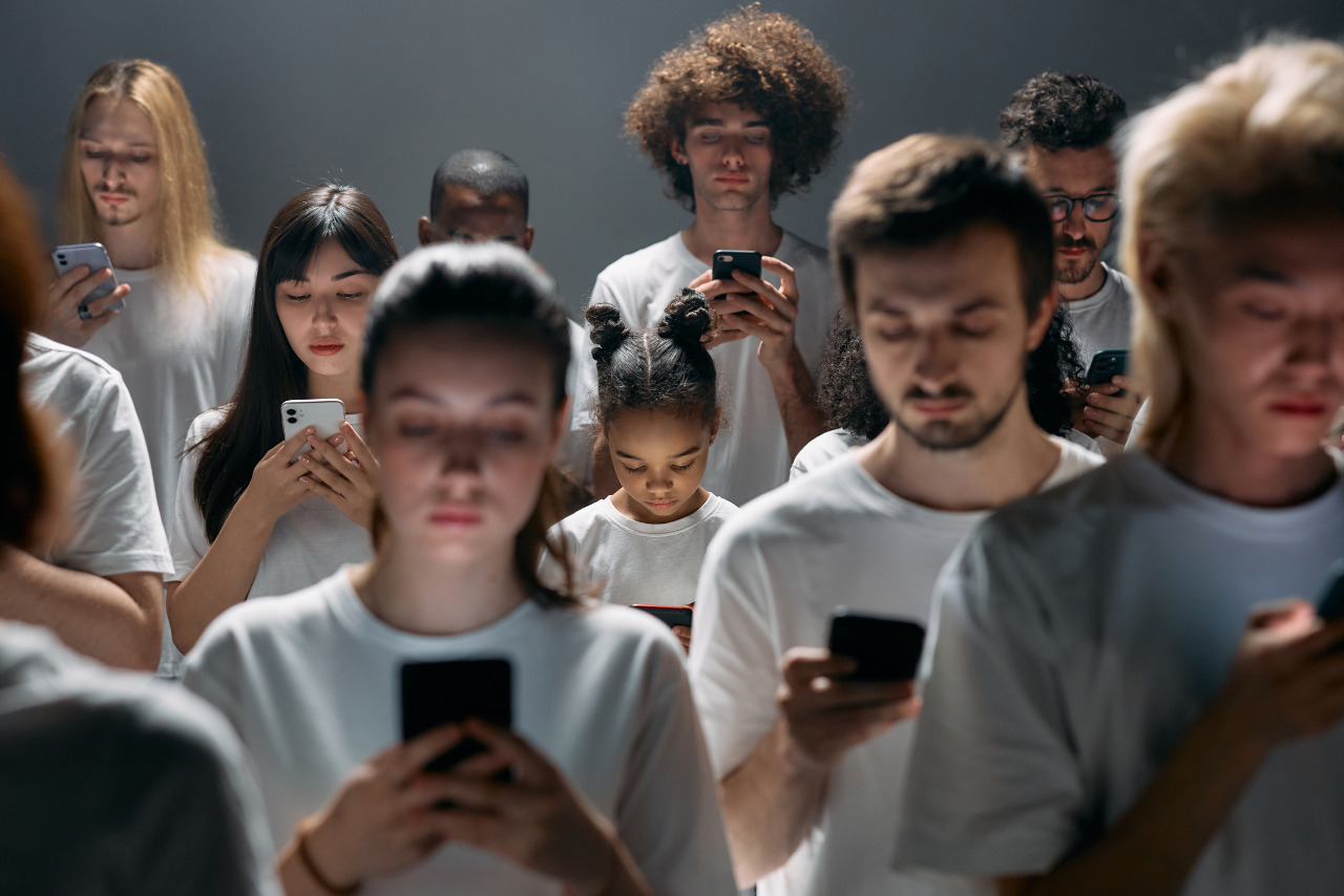 People engaged on their phones.