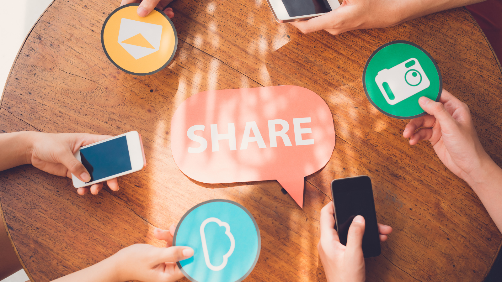 People sharing emails, videos and images via smartphone.