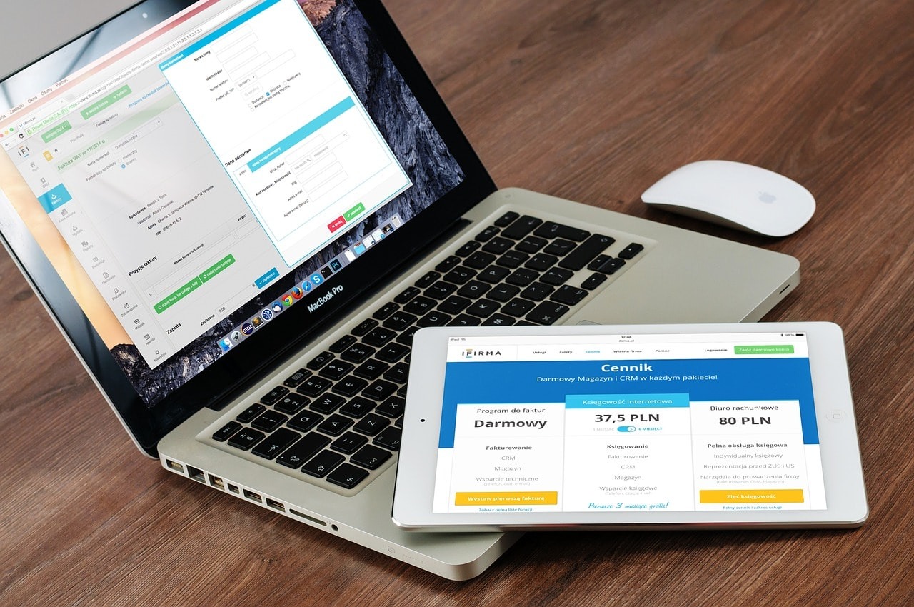Websites displayed on a tablet and a laptop.