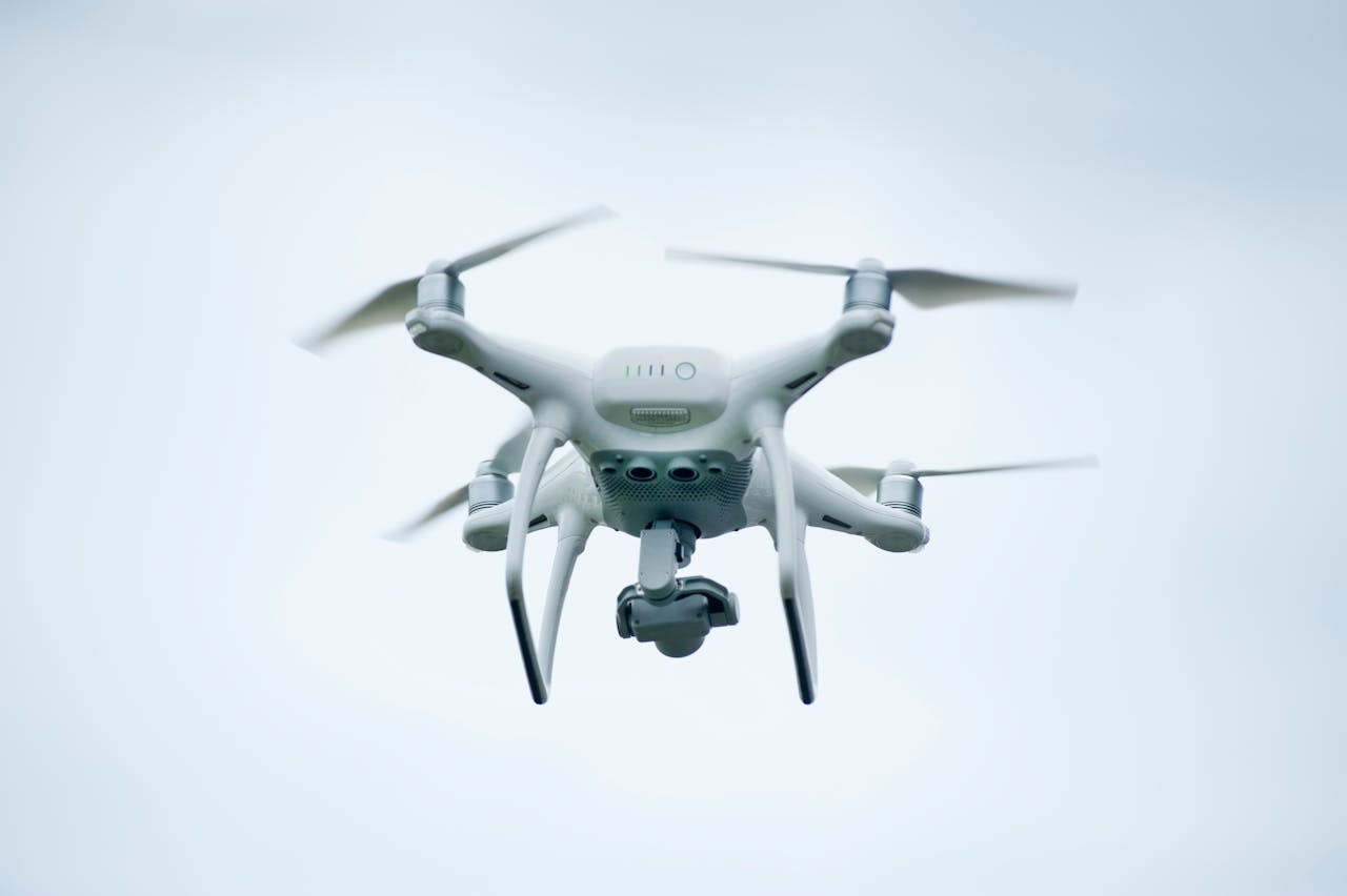 A photo of a white drone