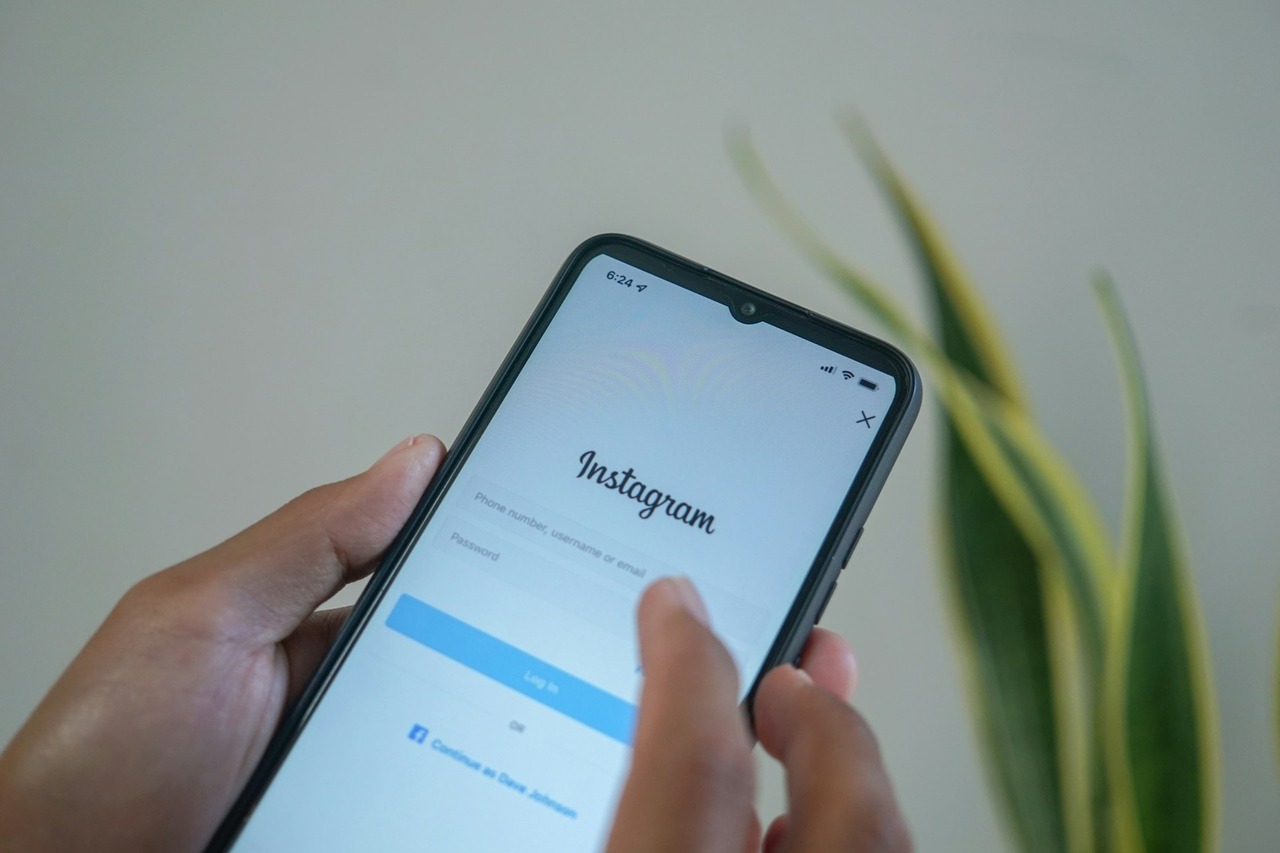 A person using Instagram's mobile app on a smartphone