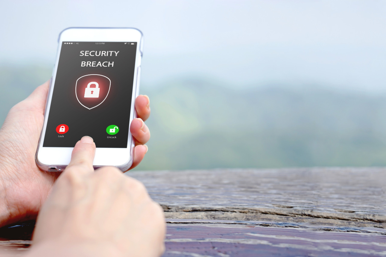 Security breach, smartphone screen.