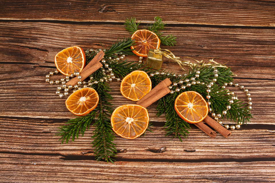 Unique holiday centerpieces made from dried oranges and cinnamon.