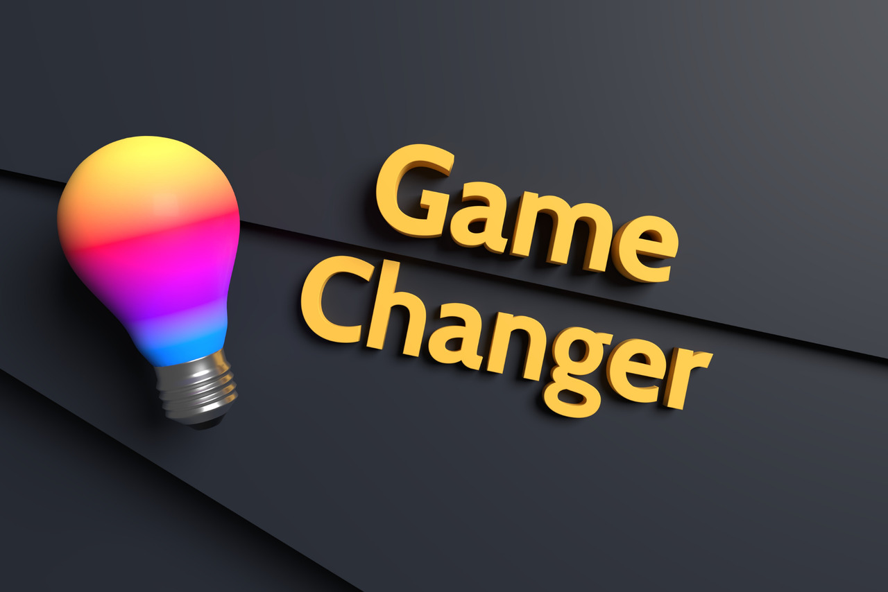 Game changer word with rainbow bulb.