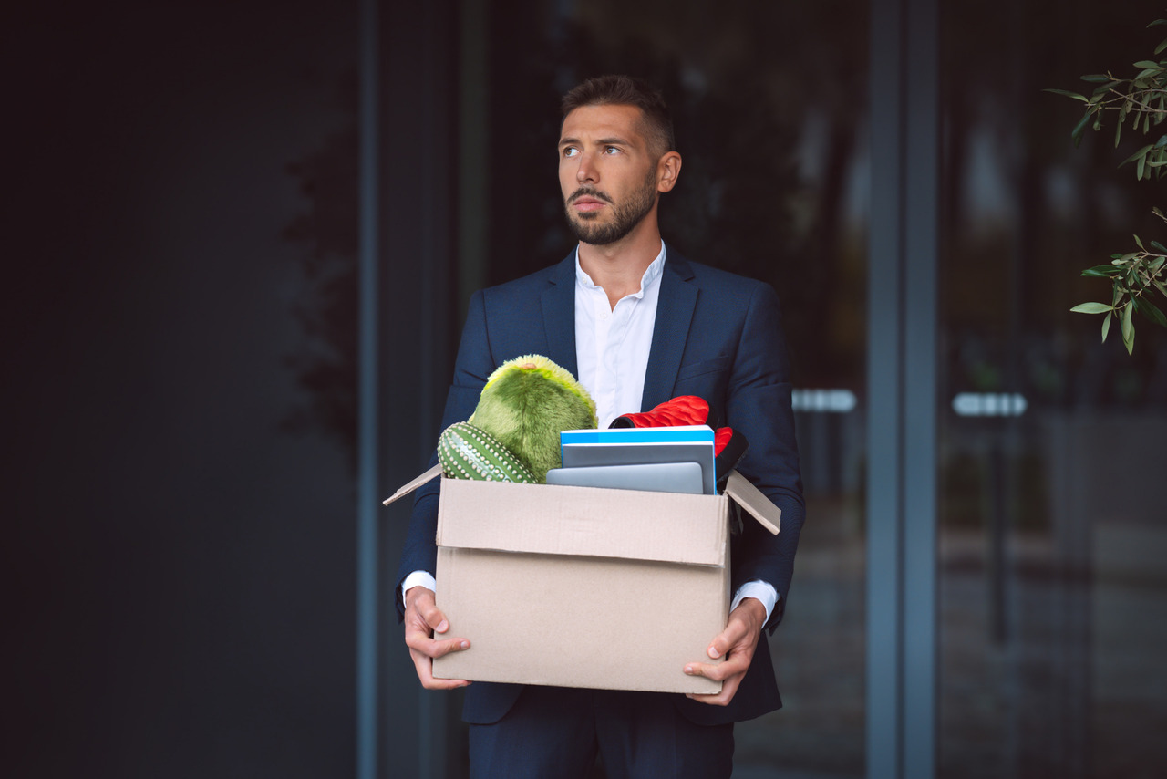 Upset man got fired from an office job.