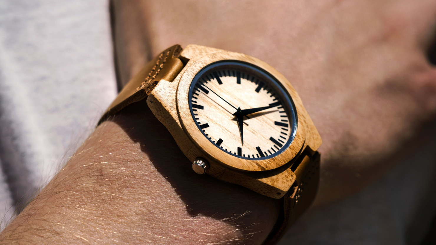 Man wearing a wooden watch.