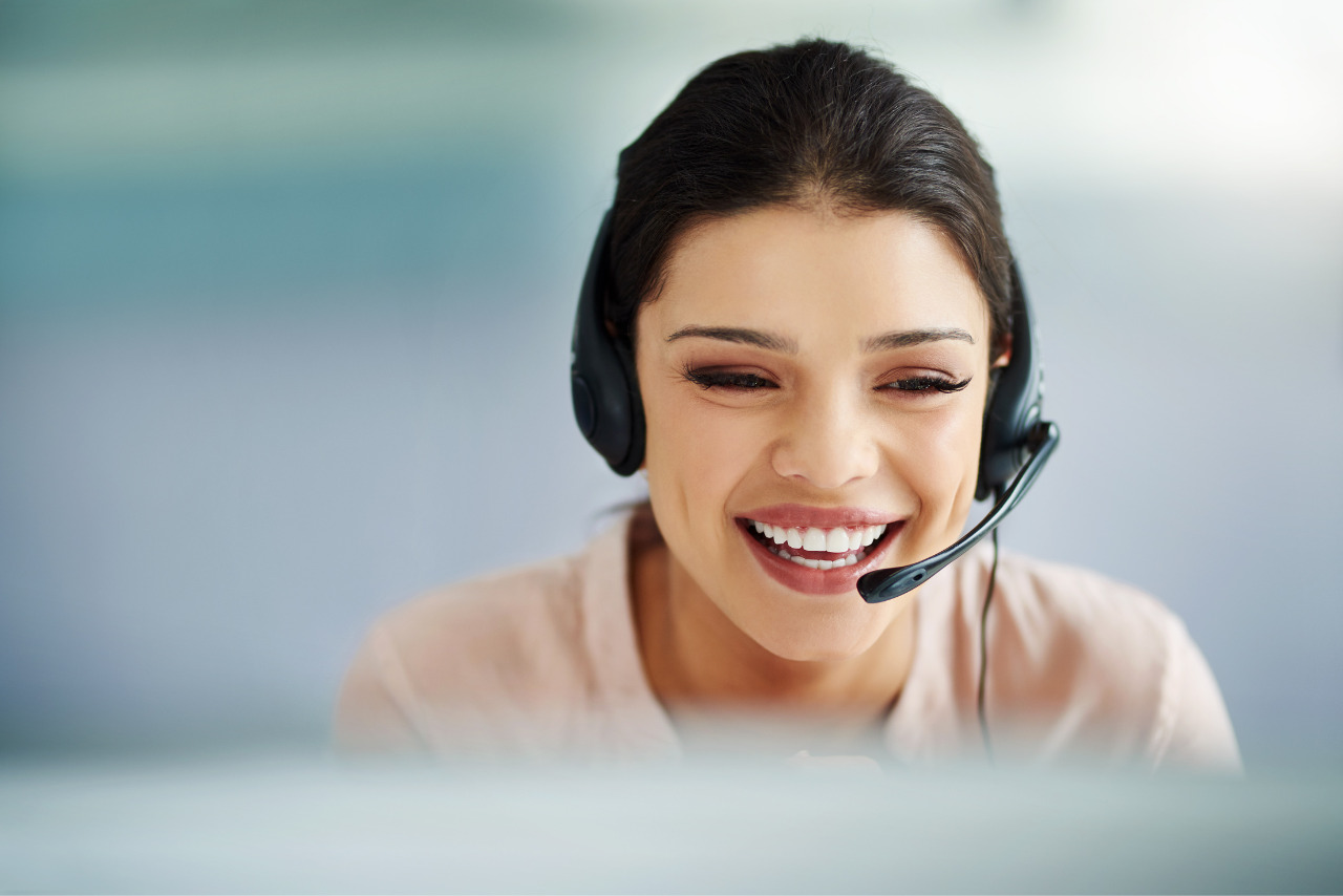 Happy customer support agent showcasing exceptional skills.