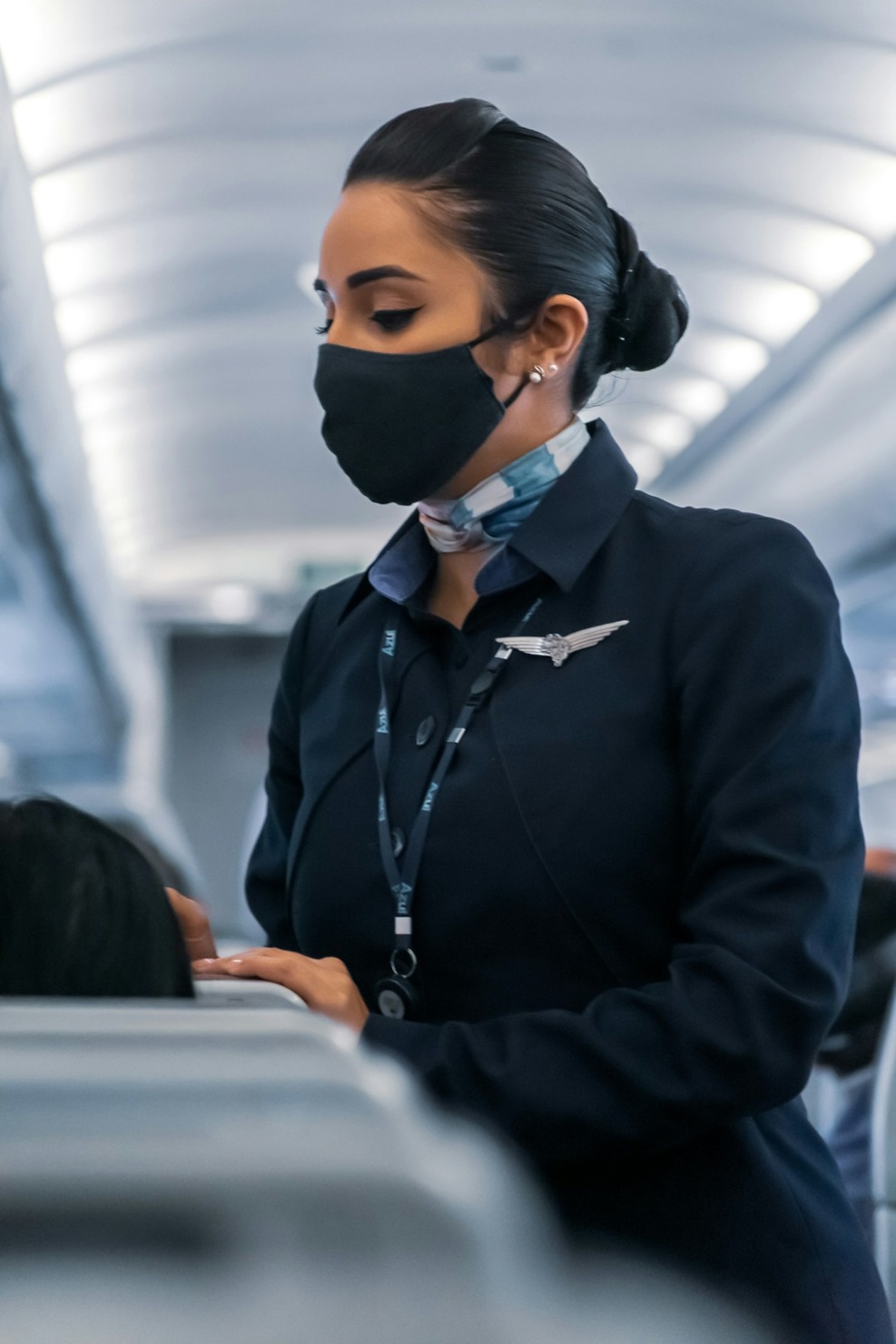 A photo of a flight attendant