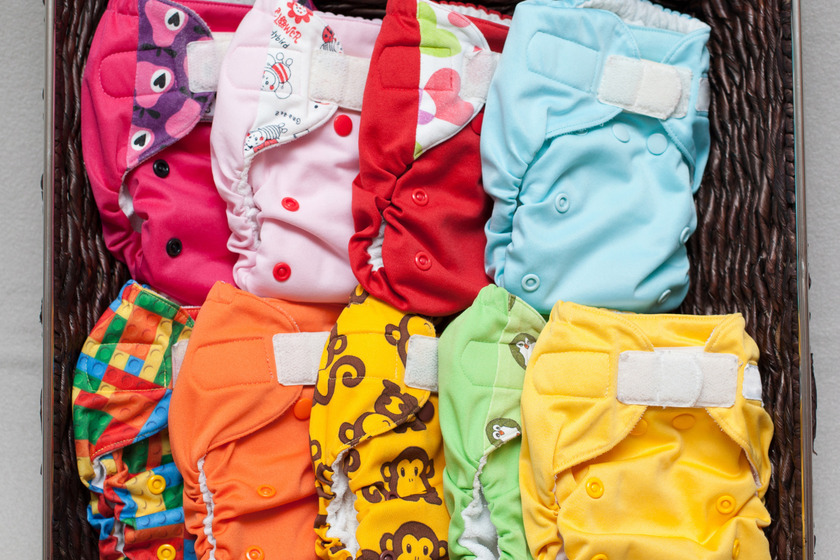 Cloth diapers in the basket.