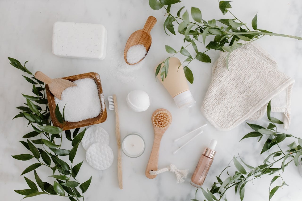 An overhead shot of bath essentials with props