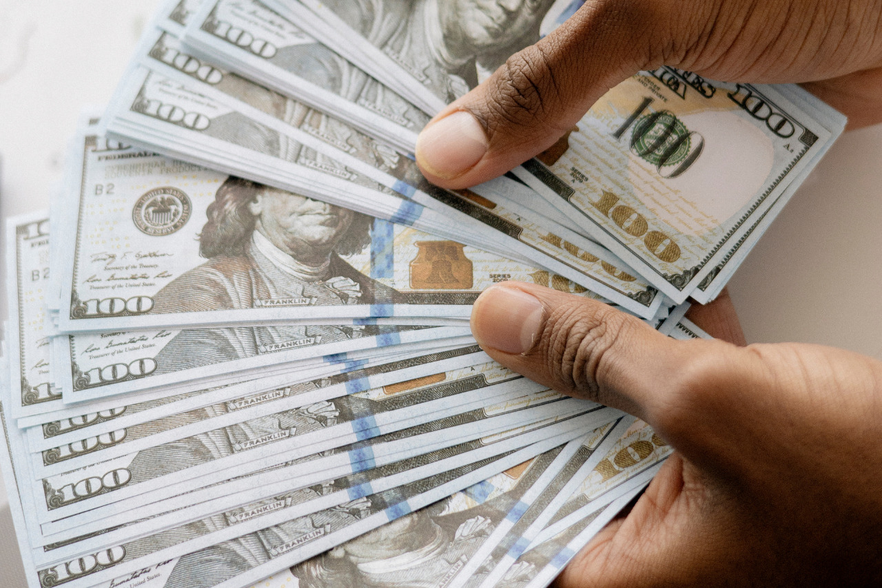 Several hundred of dollars held by hands used as capital for business.