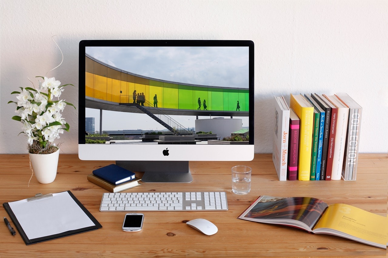 A Mac screen displaying stunning photography for a homepage hero image.