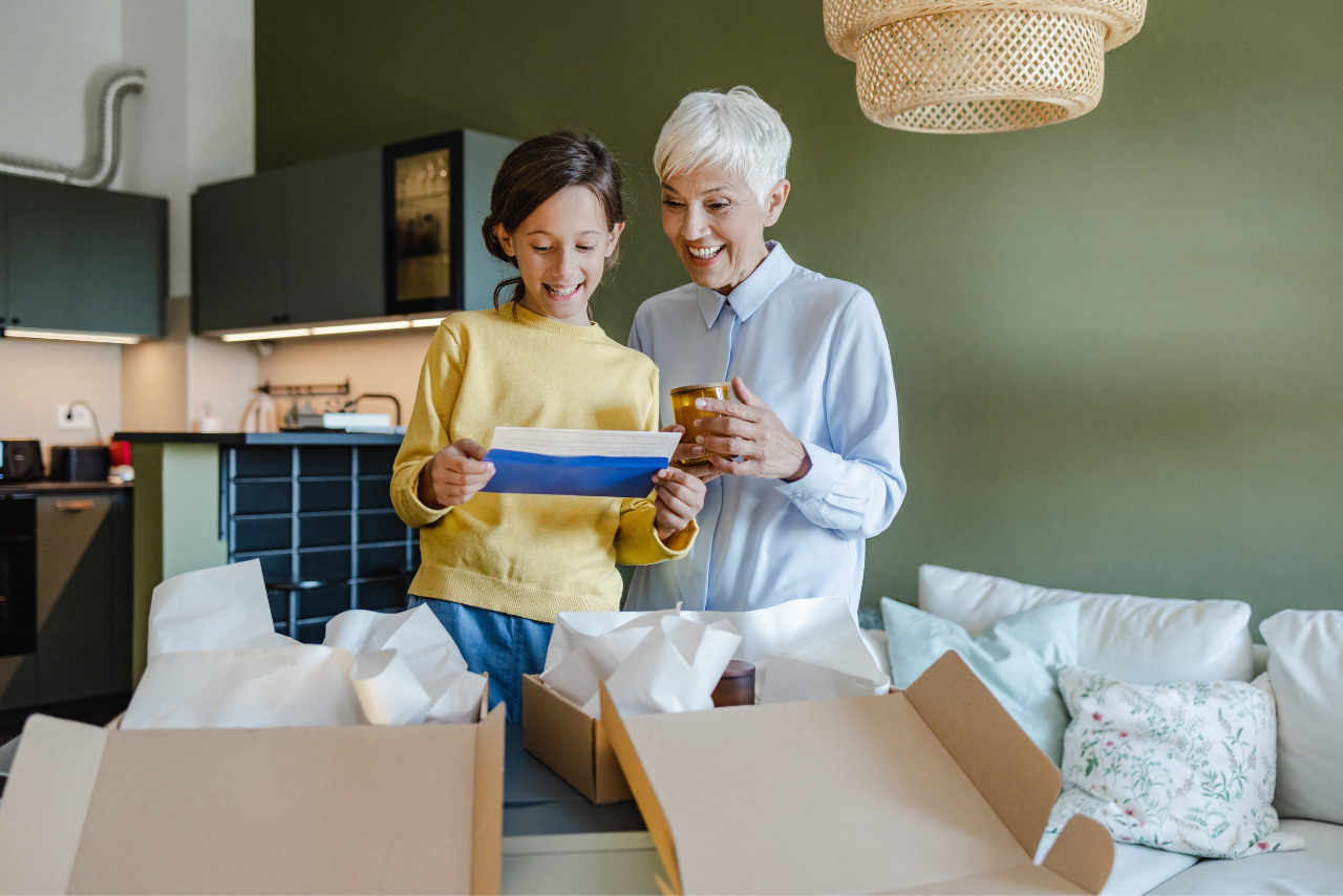 Grandma and grandchild delighted to read subscription box letter.
