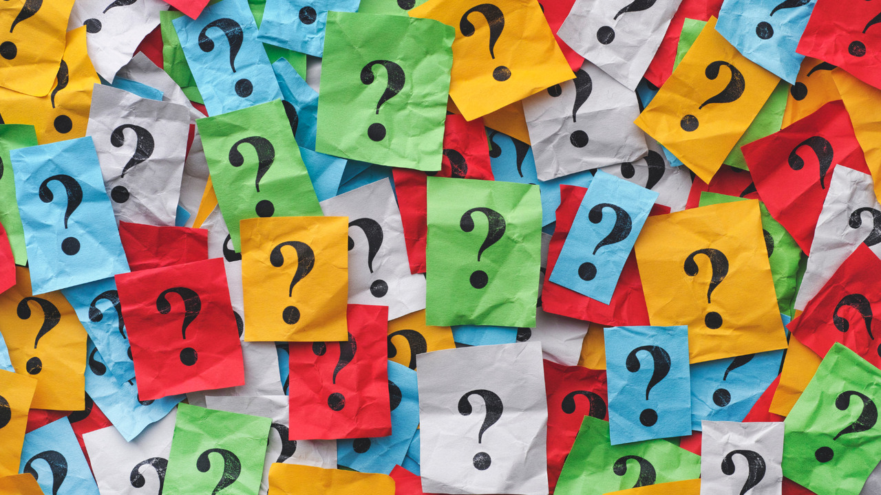 Colourful question marks demonstrating the use of questions on subject headings.