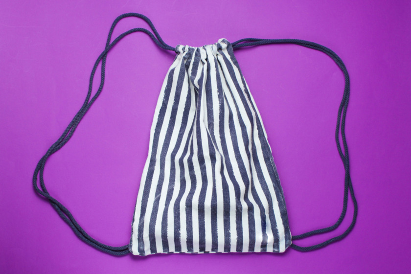 A striped drawstring bag.