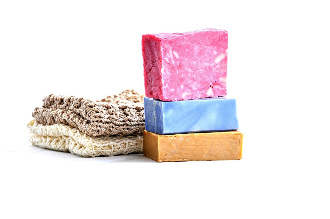 A display of soap bars and washing material.