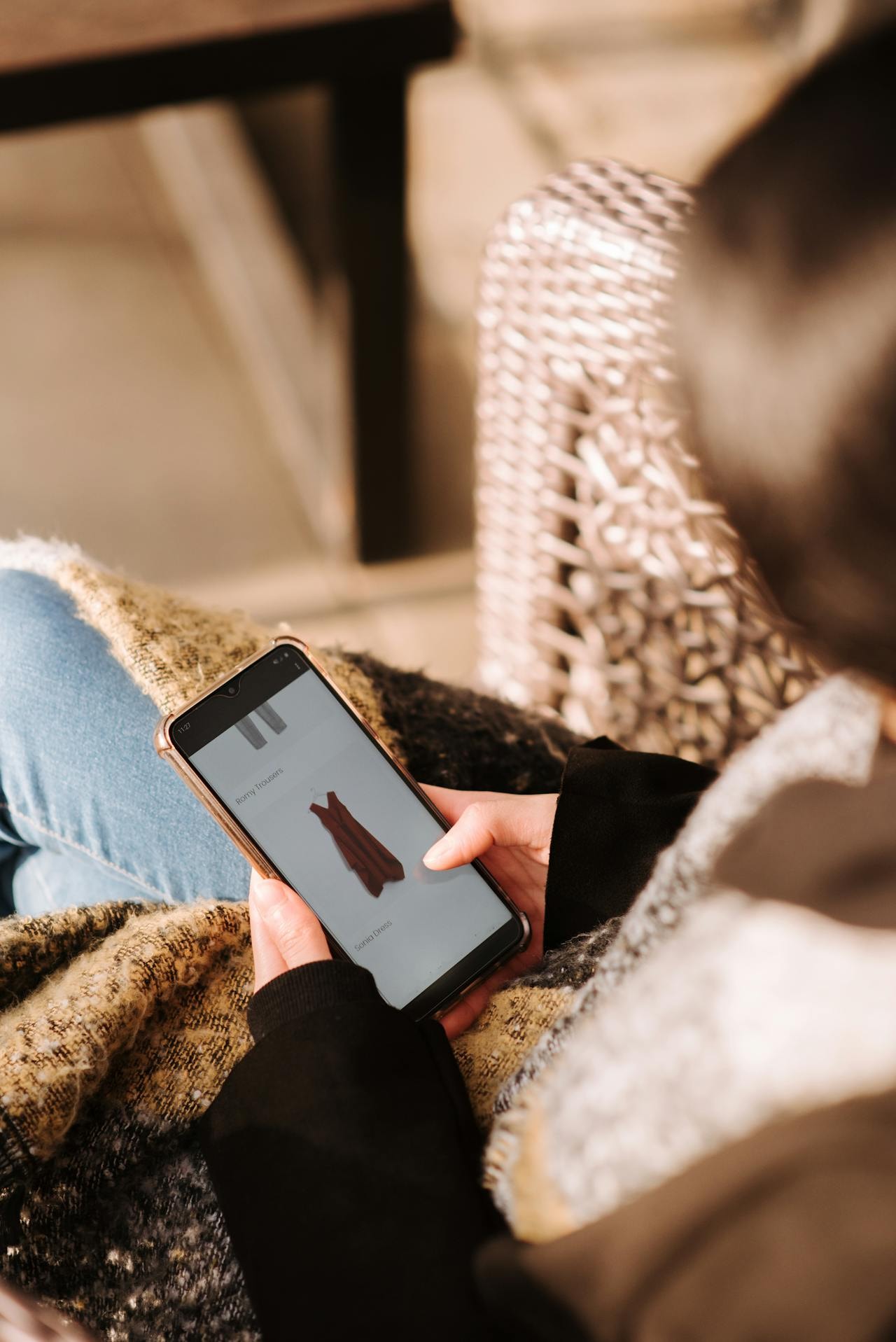 A woman using a smartphone for online shopping