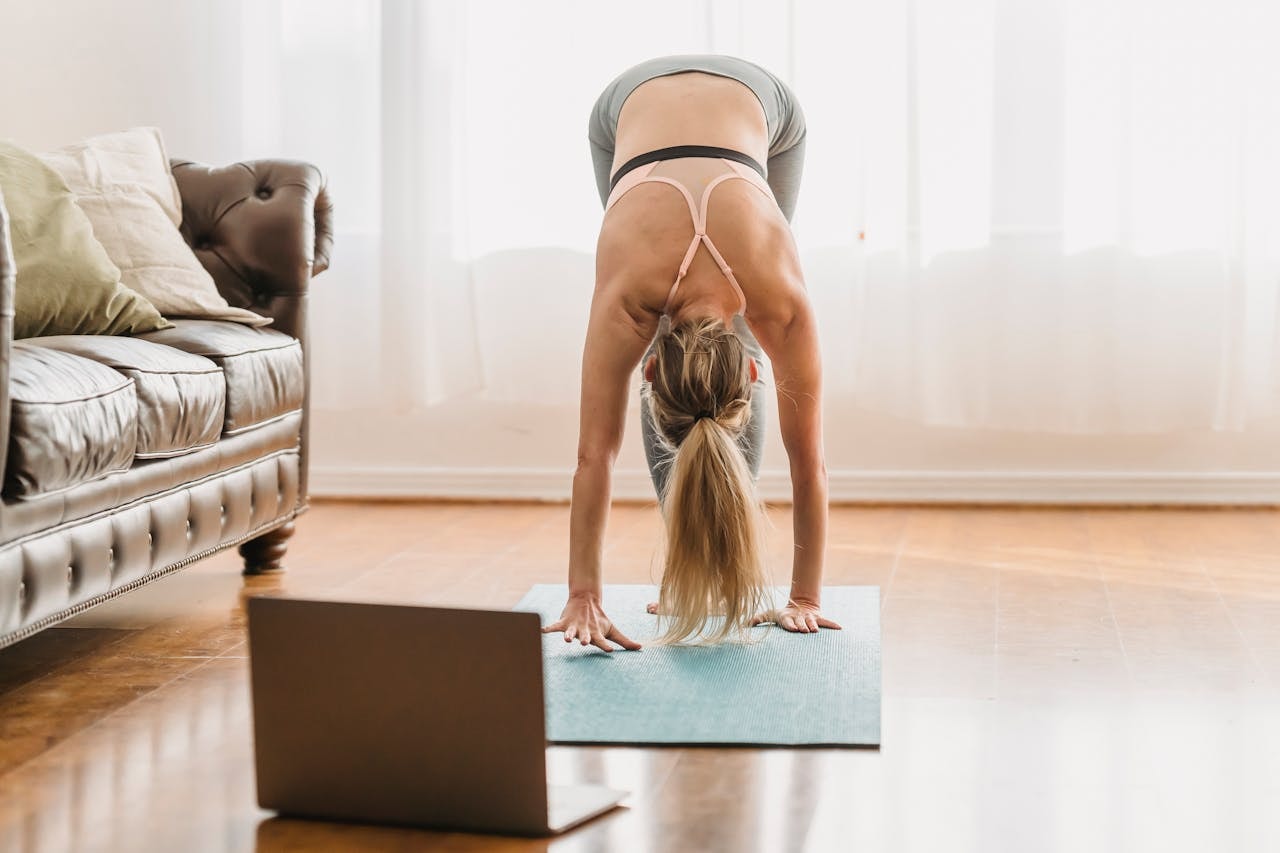 A yoga instructor having a live class