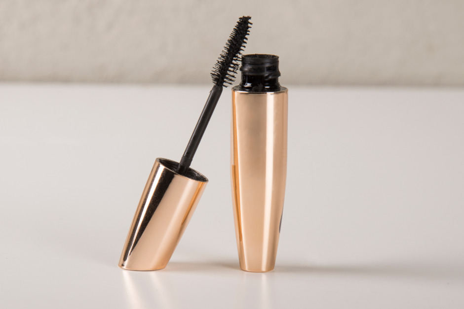 Black rich mascara on table.