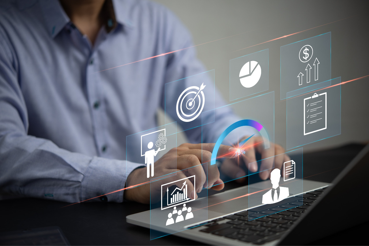 Businessman clicks on hologram of metrics and KPI key performance indicators.