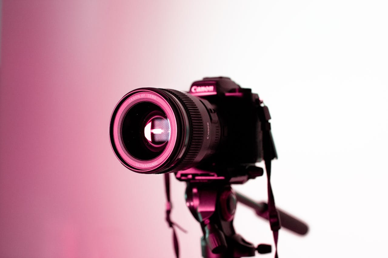 Close-up shot of a camera attached to a tripod