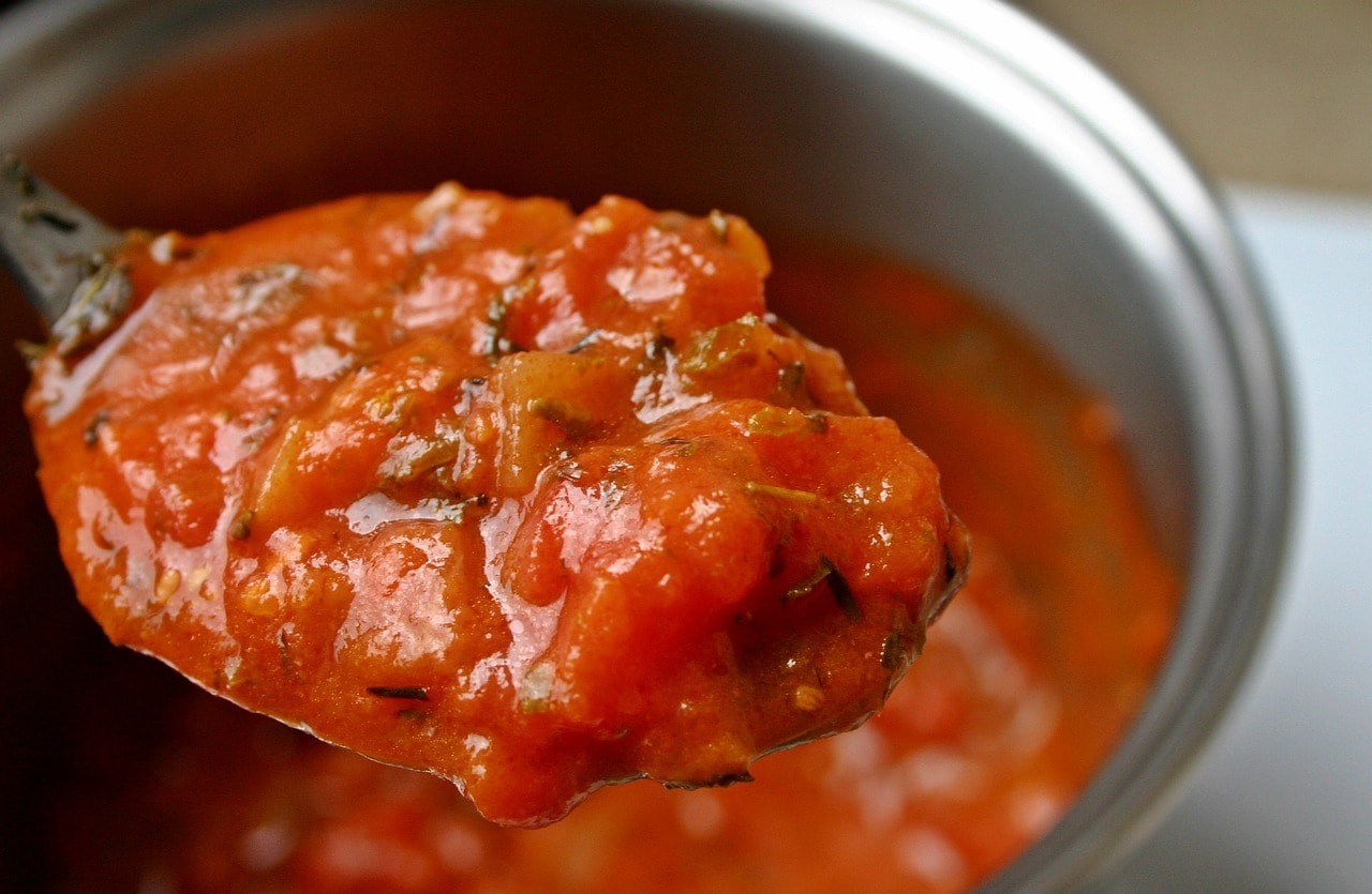 Sauce on a spoon.