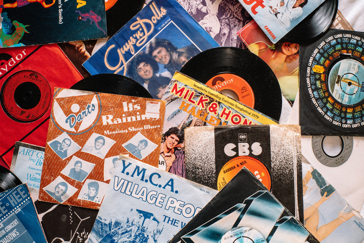 Set of retro vinyl records on table.