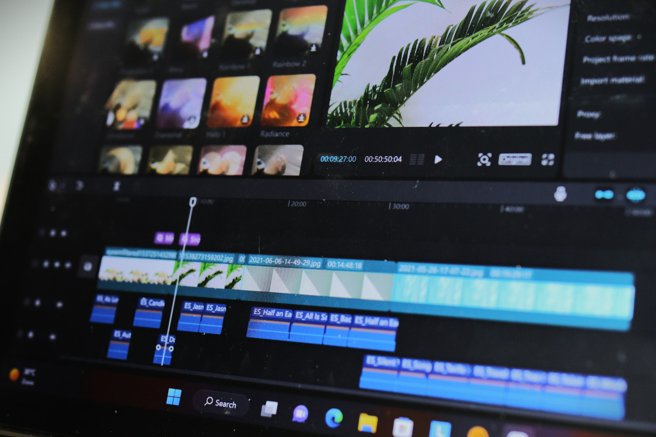 Shortening old videos on laptop screen.