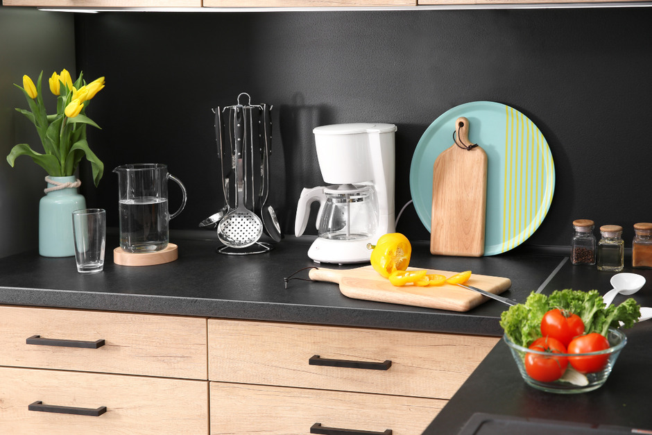 Stylish kitchen counter with houseware and products.