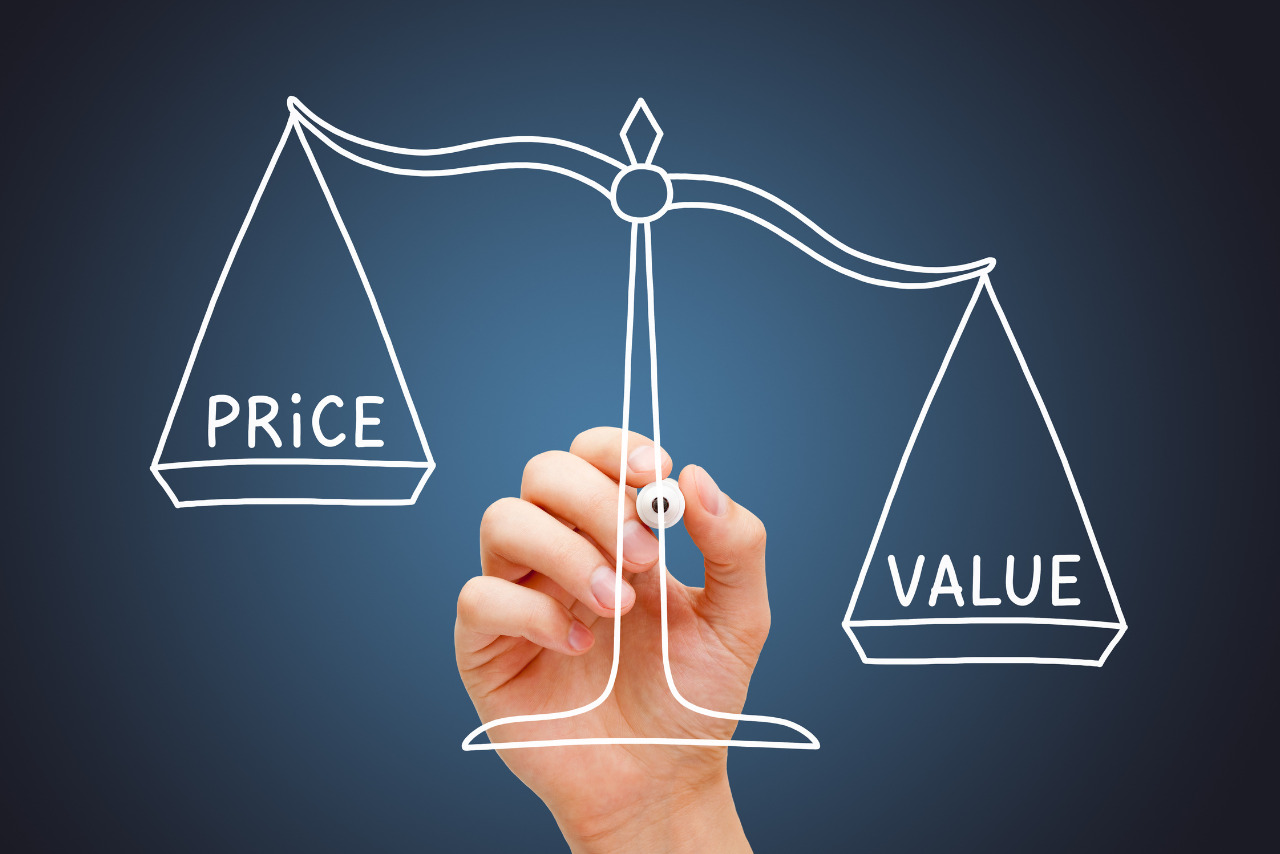 Value and Price words on a balance scale.