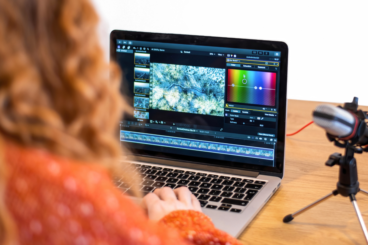 Woman Editing a Video on Laptop.