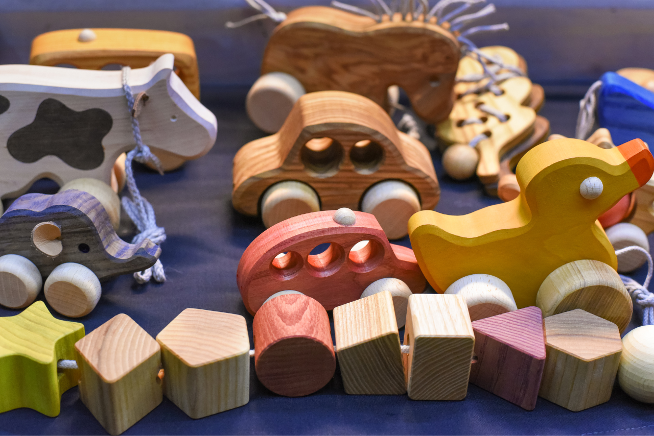 An assortment of wooden handmade eco friendly toys.